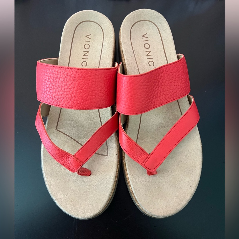 Vionic size seven red/orange slip on sandal ($125)
